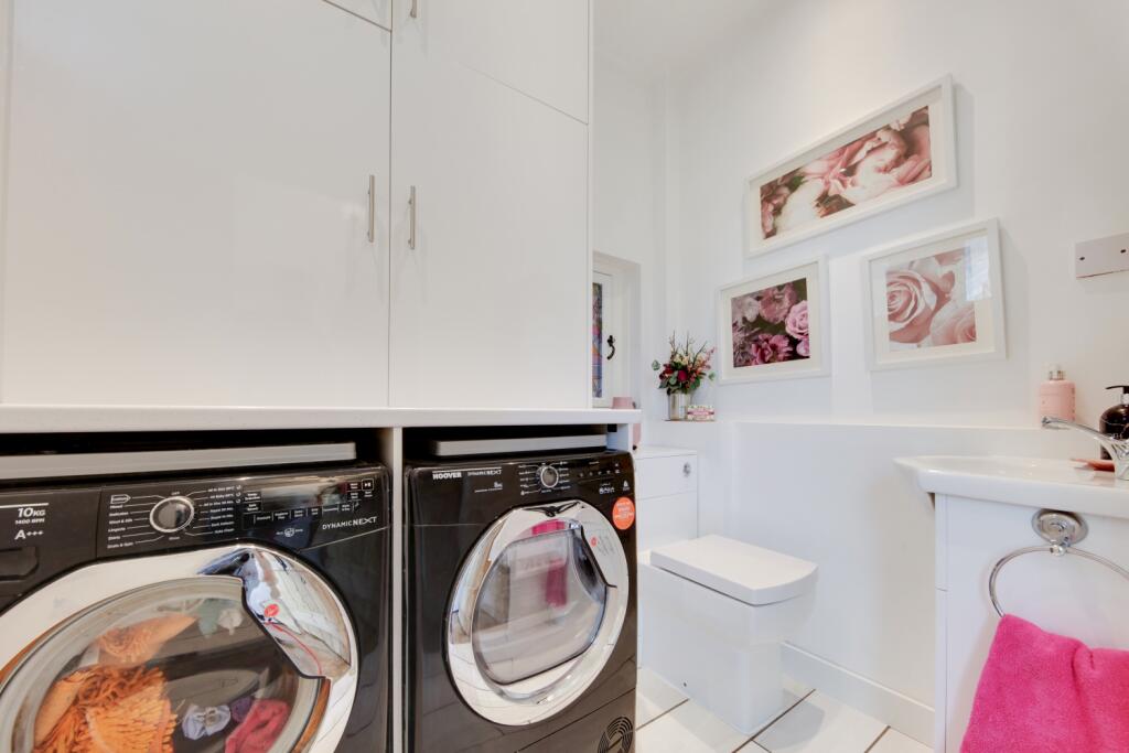 and cloakroom with further storage