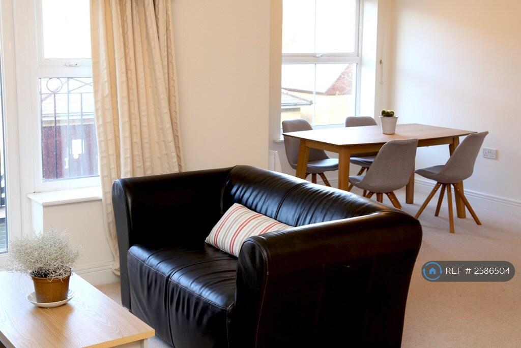 Living Area With View To Dining Area