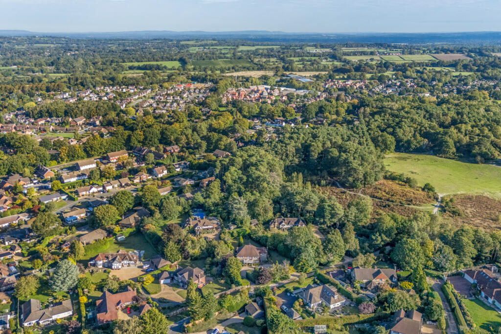 Drone of countryside &amp; front of house