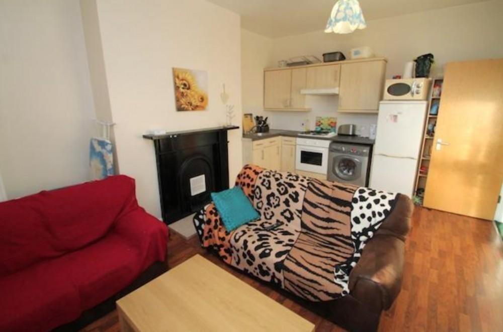 Cozy and welcoming living room featuring comfor...