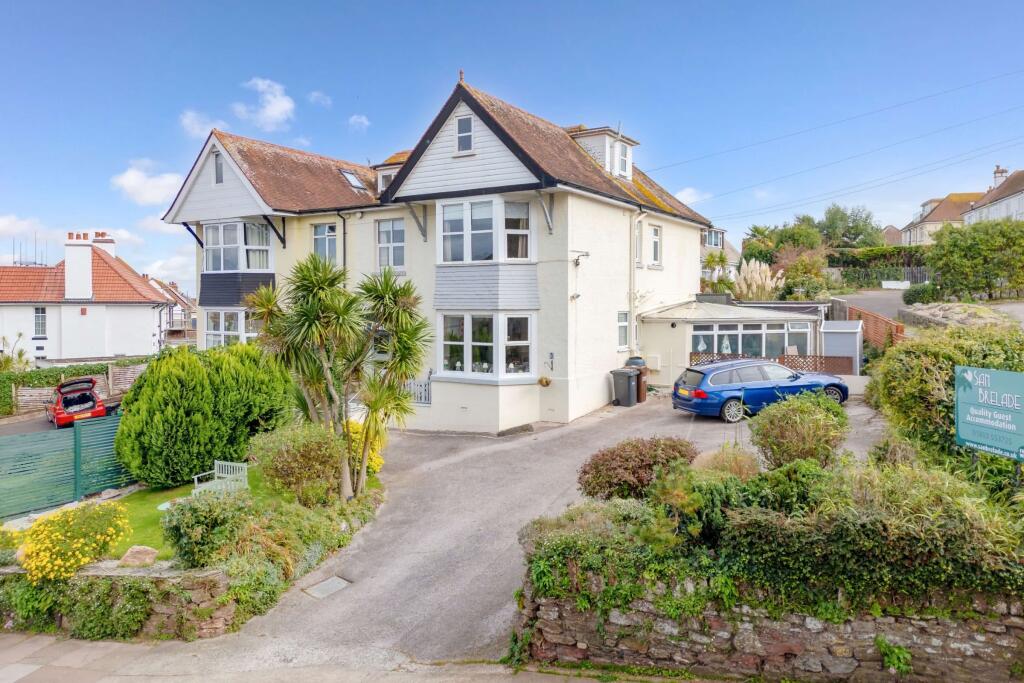 Side aspect with frontage &amp; broad driveway