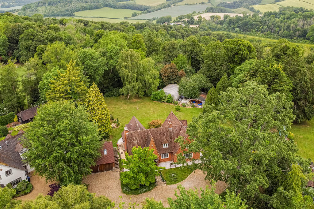 House, garden and woodland to the rear