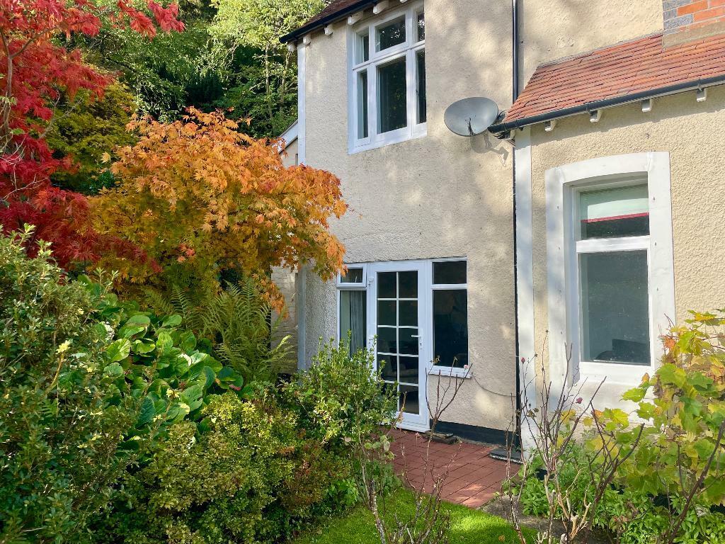 Side door from study to raised lawn