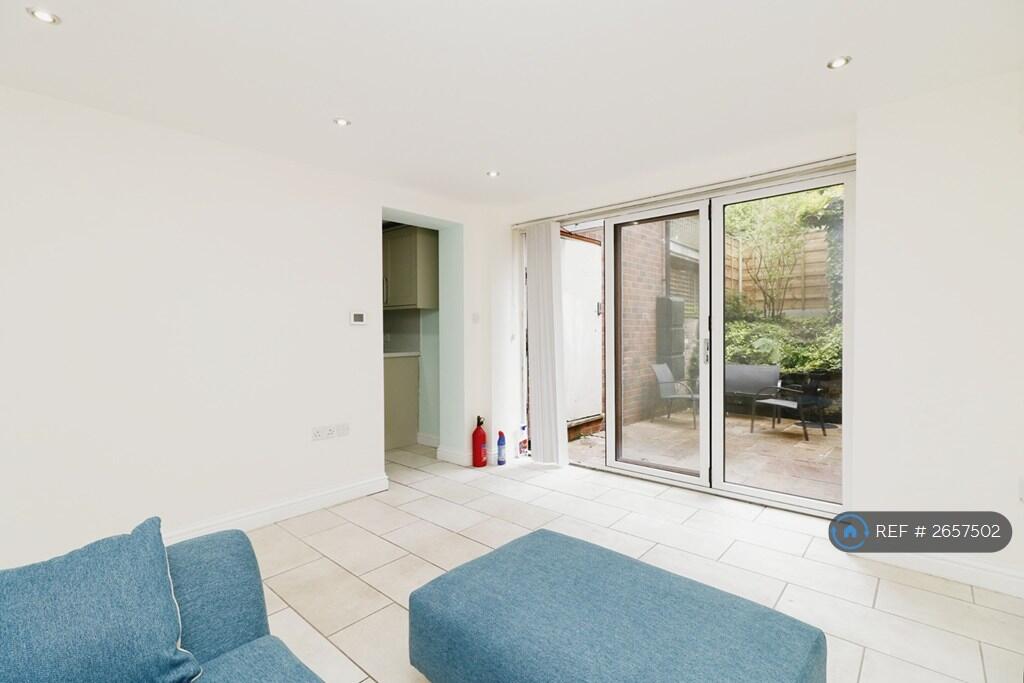 Living Room With Kitchen Entrance