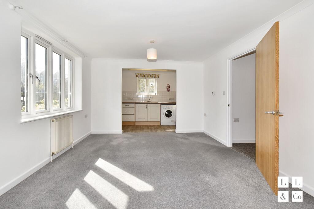 Open plan living area with kitchen