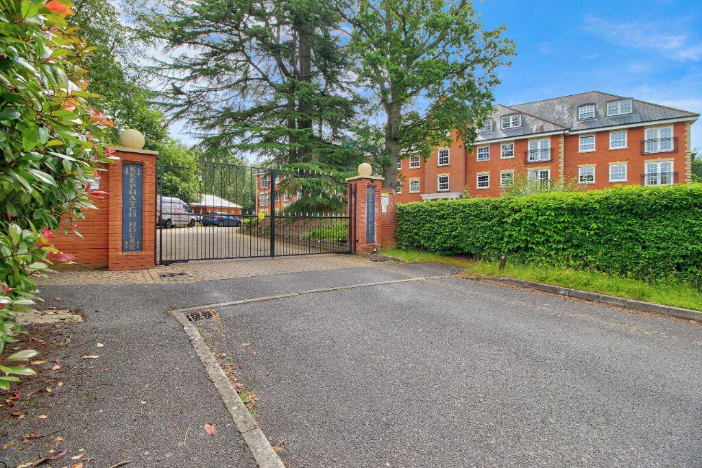 Gated entrance and two parking spaces