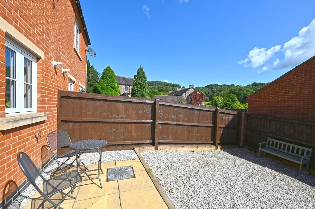 Rear Garden - bench and patio.jpg