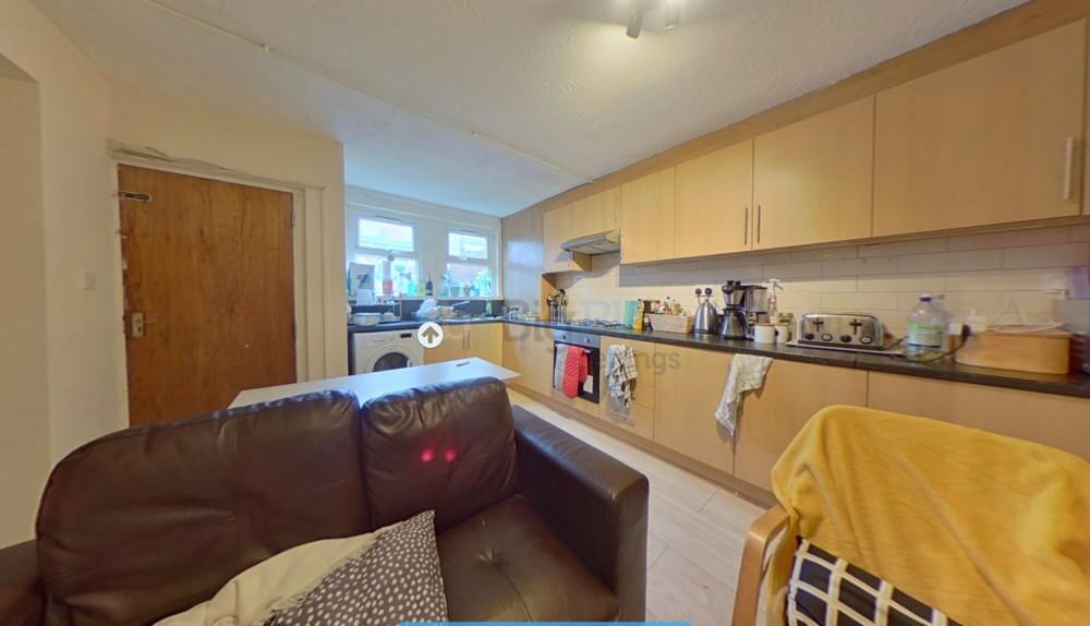 A functional kitchen space featuring ample wood...