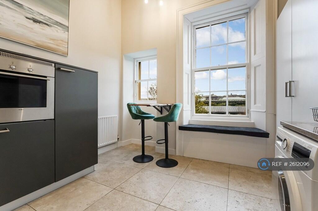 Kitchen With Breakfast Bar - View Of Castle
