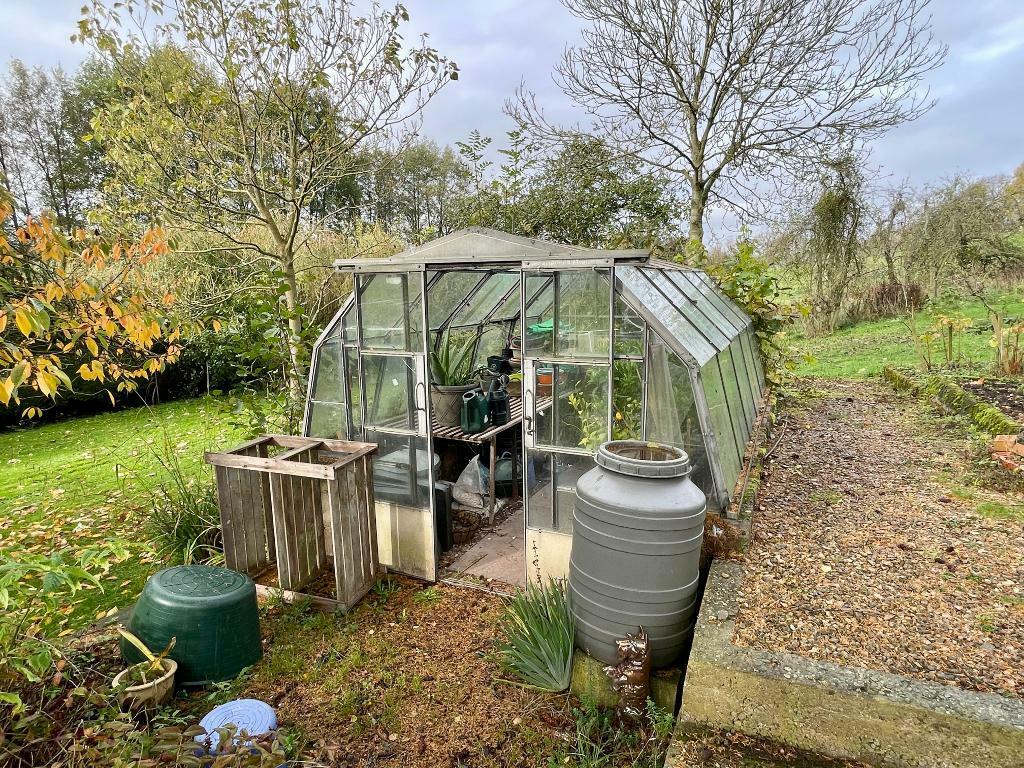 Land and greenhouse