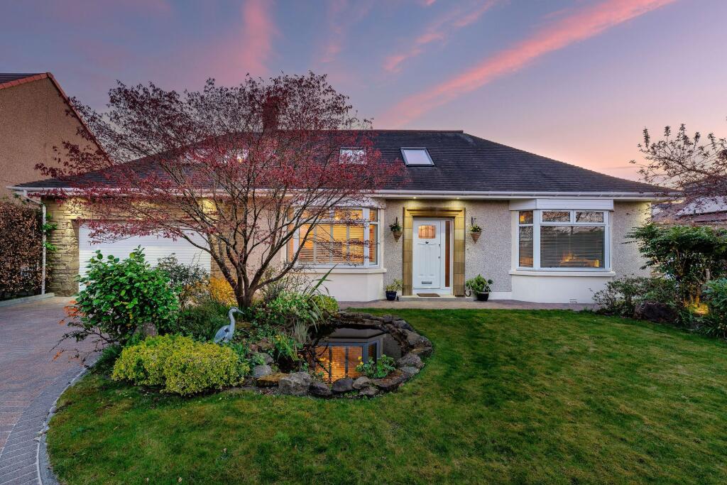 Front of house at dusk