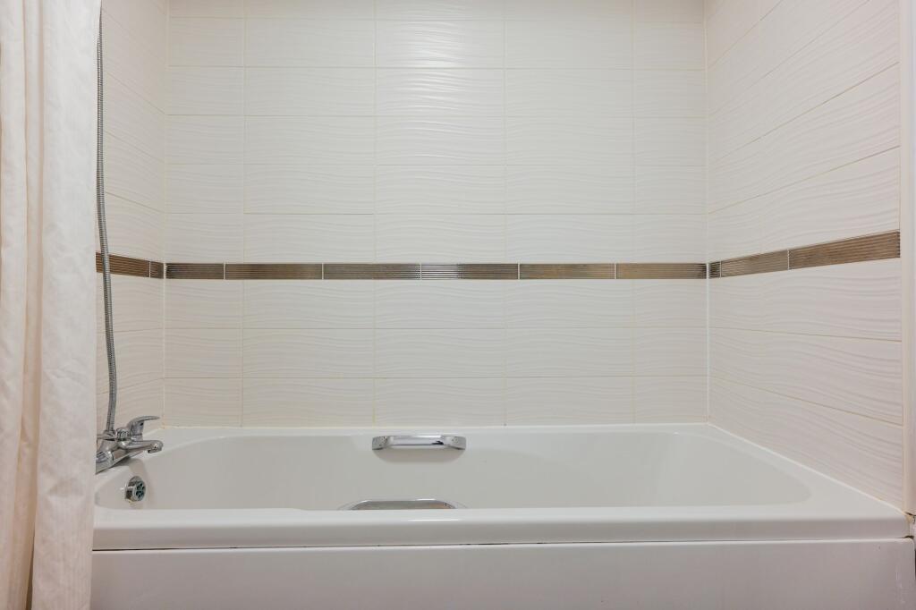 Family Bathroom with tub and overhead shower