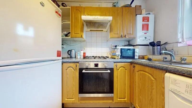 Bright and functional kitchen featuring wooden ...