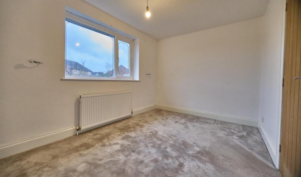 REAR BEDROOM ONE