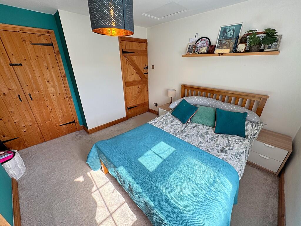 Bedroom One alt a...