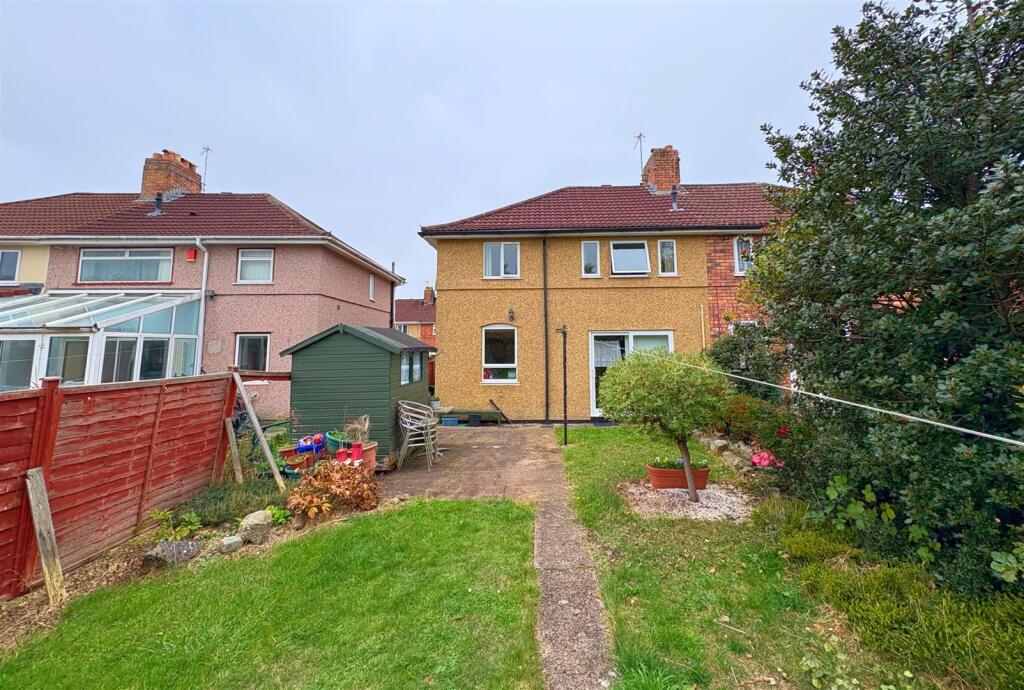 Rear view of property and patio.jpg