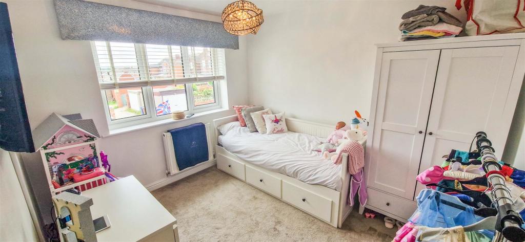 SECOND BEDROOM