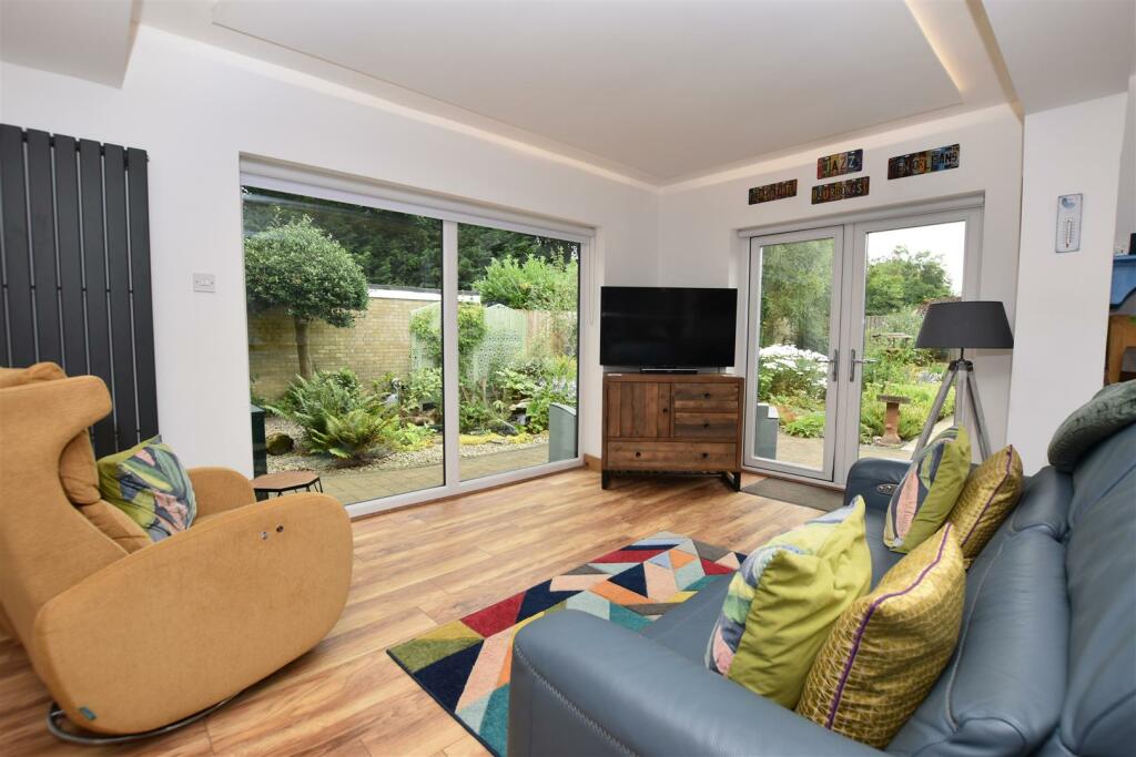 Dining Kitchen - Sitting Room Area.JPG