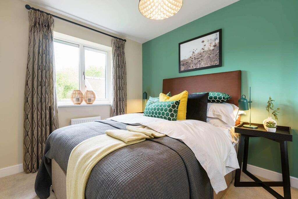 The second double bedroom offers plenty of space