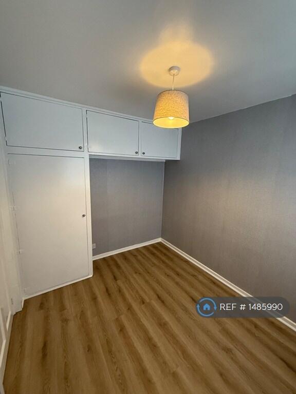 Bedroom With Storage Cupboards 