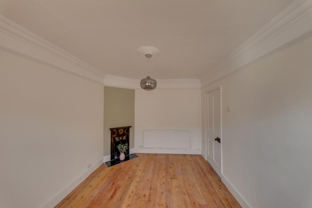 wood floors and feature fireplace