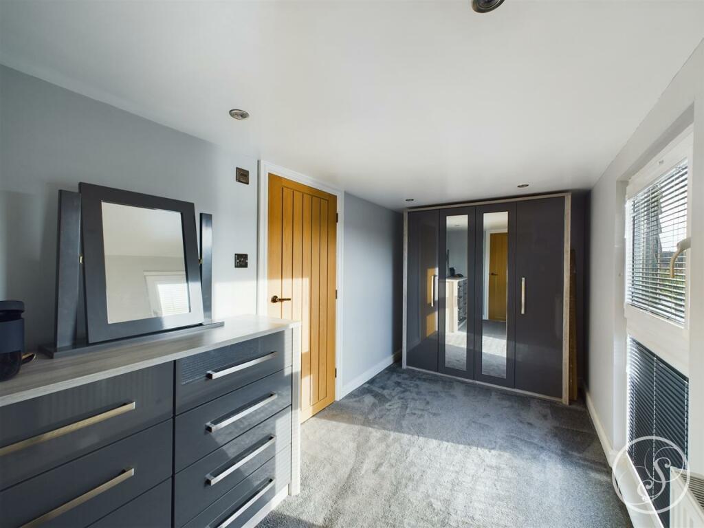 BEDROOM FOUR/DRESSING AREA