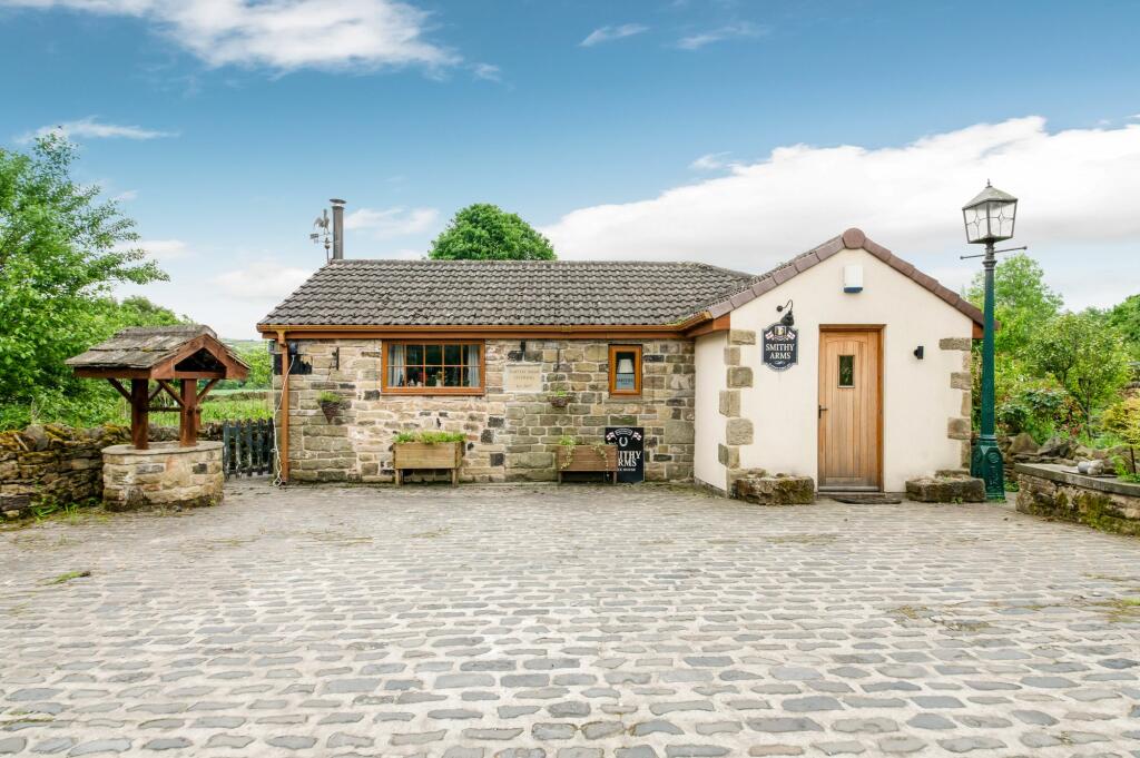 SMITHY ARMS