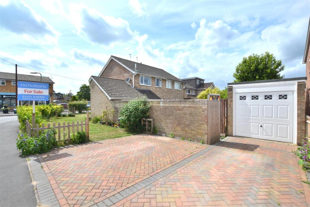 Garage &amp; Driveway Parking For Two Vehicles.JPG