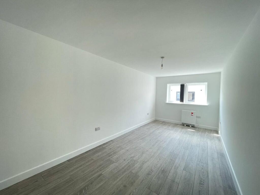 Copenhagen Flat Primary Bedroom 1.jpg