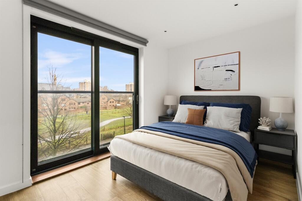 Wake up to serene views every day in this stylishly designed bedroom.
