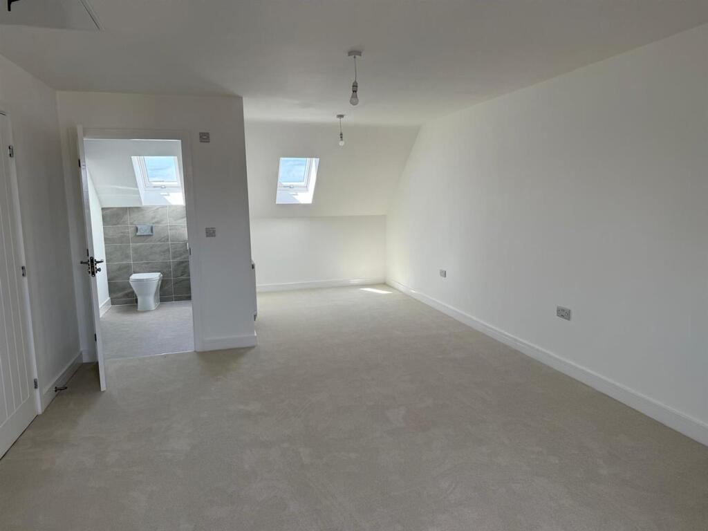 Plot 403 bed 1 to dressing area.jpeg