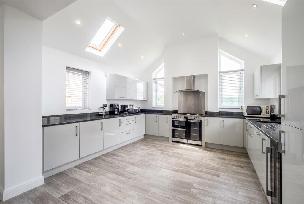 Open plan Kitchen/Dining/Living space