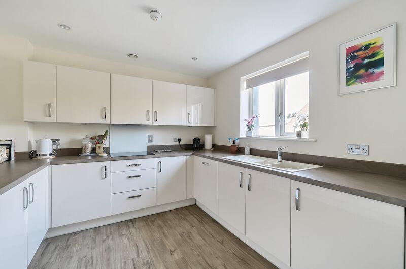 Kitchen with built-in appliances