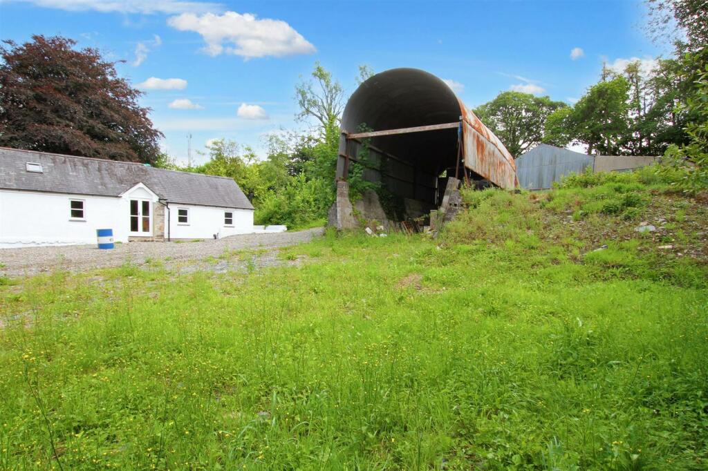 Front view of property and grounds inc Dutch Barn