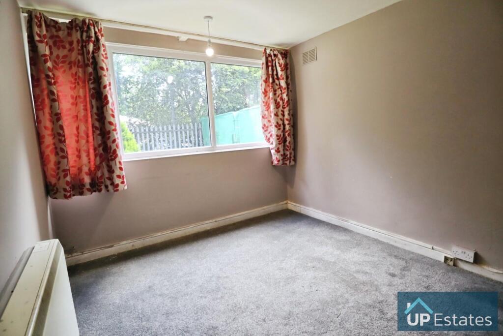 FIRST BEDROOM