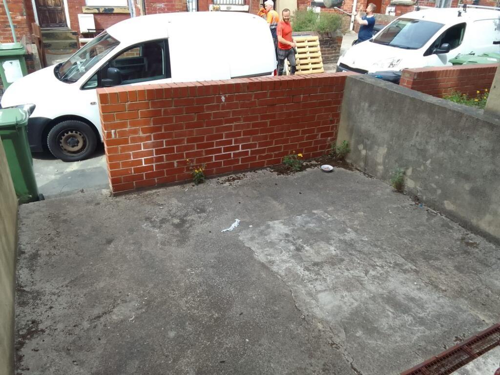 View of the front of a terraced house featuring...