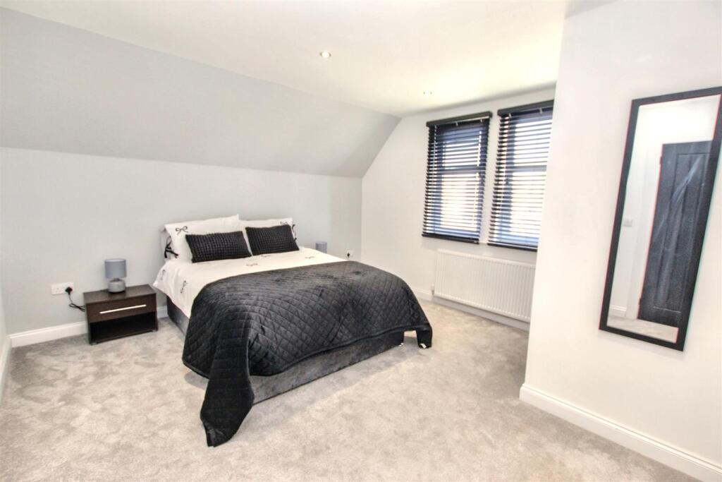 9- Bedroom One.jpg