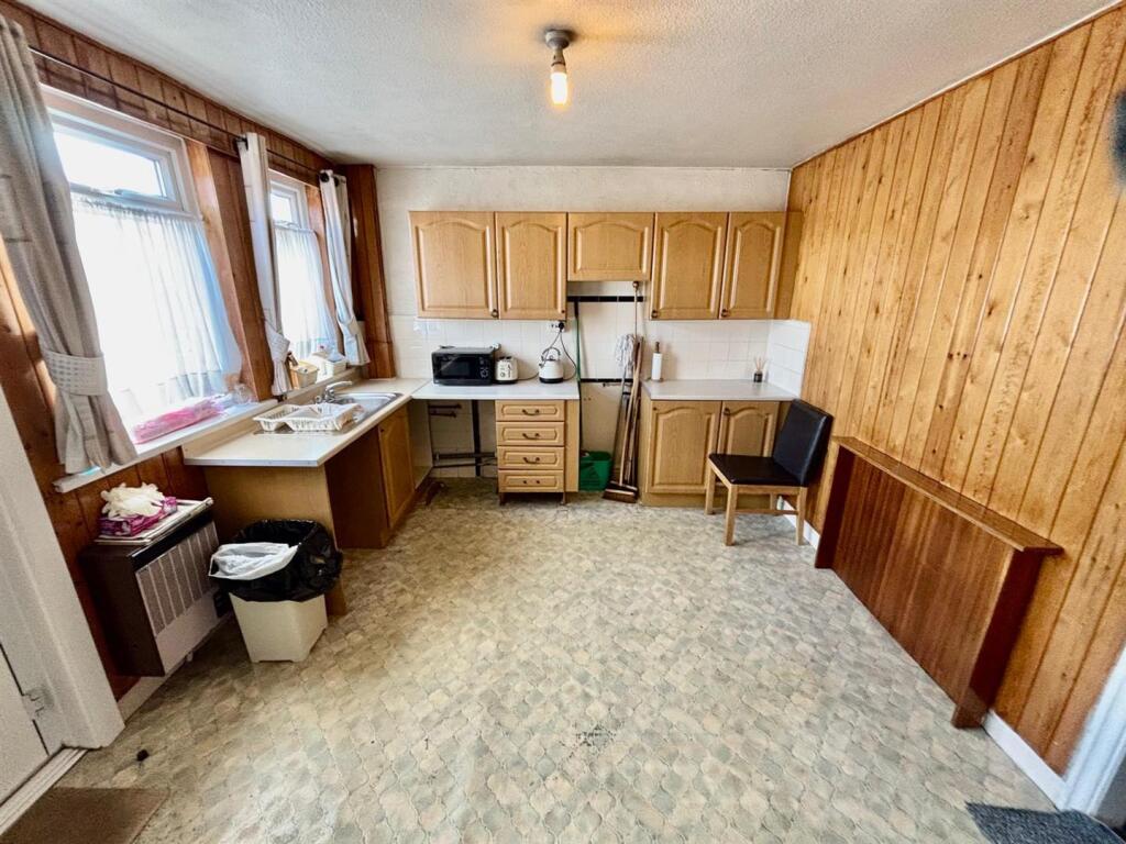 Entrance Dining Kitchen: