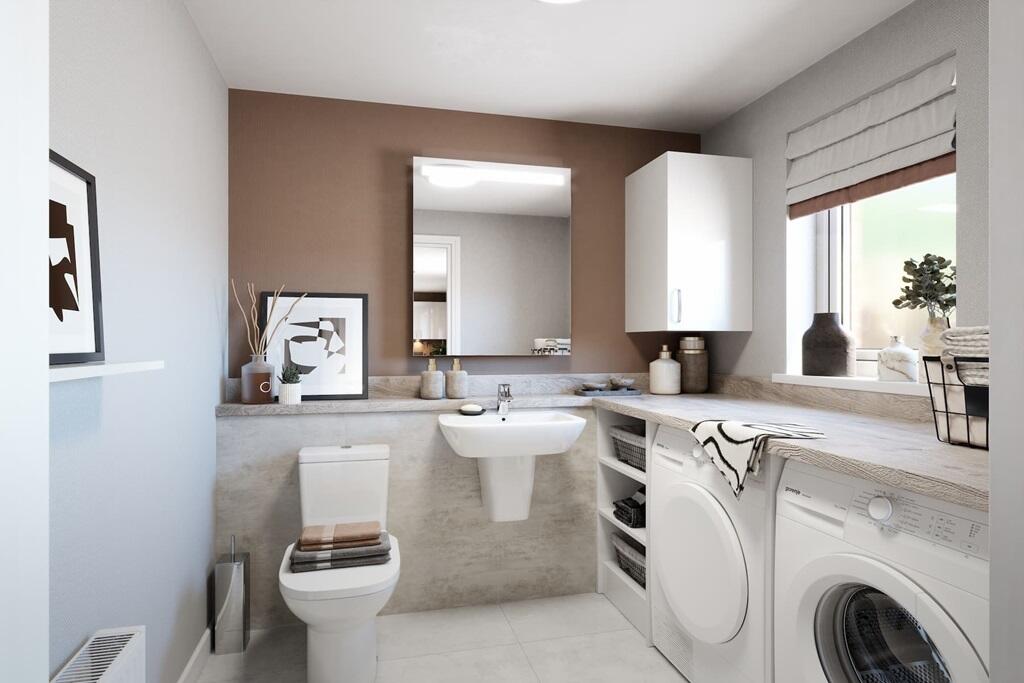 A multi-purpose utility/WC sits off the kitchen/diner