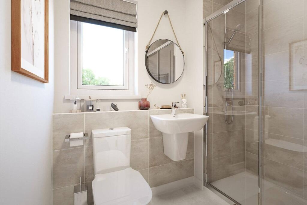 The ensuite features a large double shower