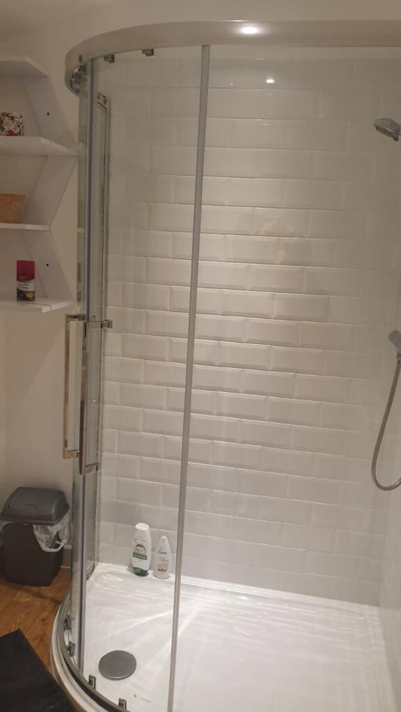 A modern and clean bathroom featuring a stylish...