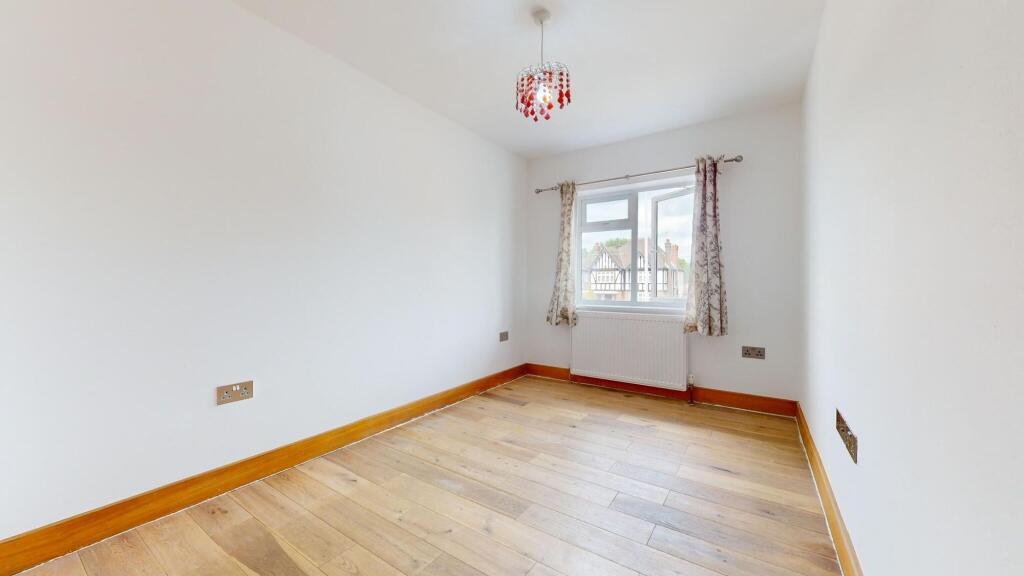 Bright and welcoming room with large window all...