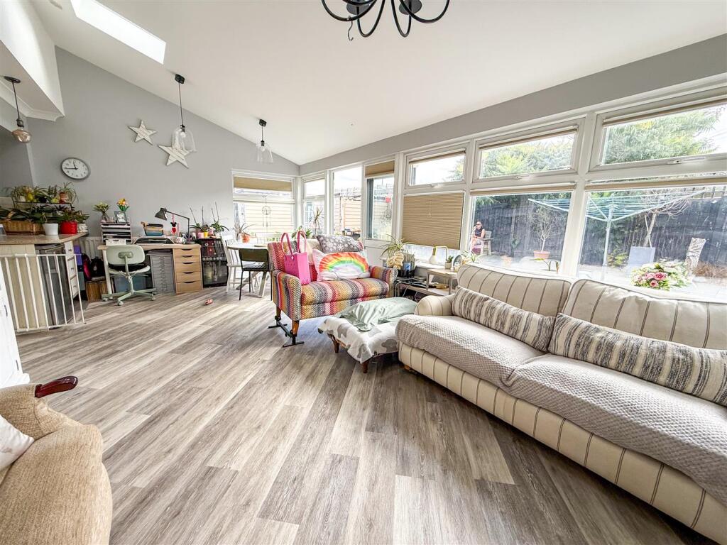 ADDITIONAL VIEW OF LOUNGE/FAMILY ROOM