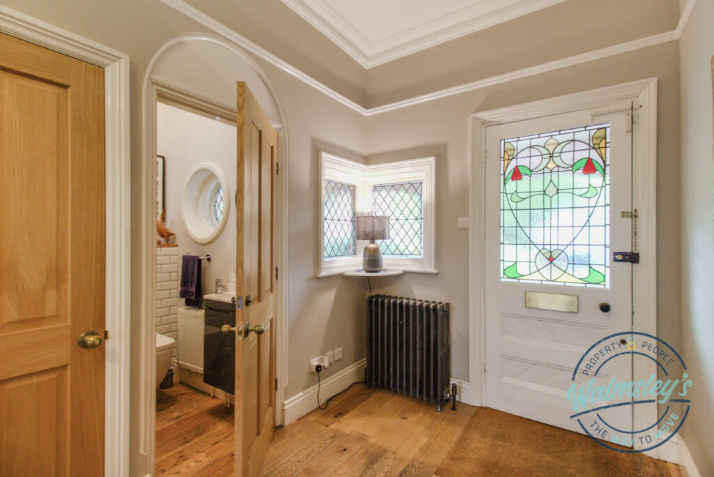 Entrance hallway with cloakroom store &amp; WC