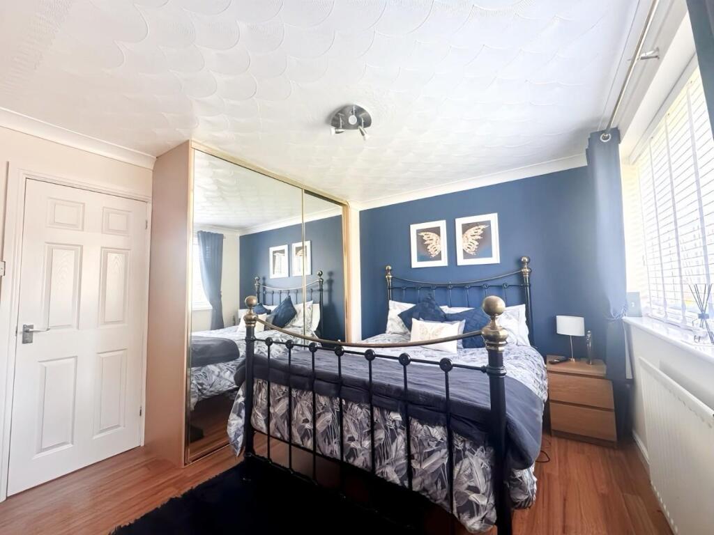 PRIMARY BEDROOM 2.jpg