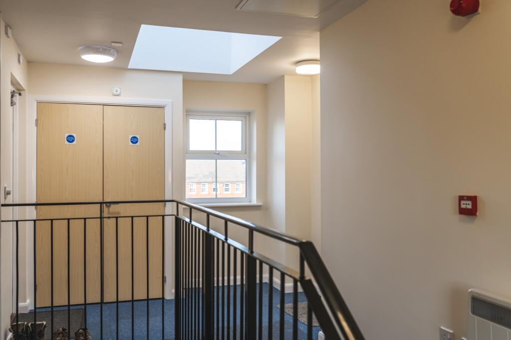 Second floor hallway to apartment
