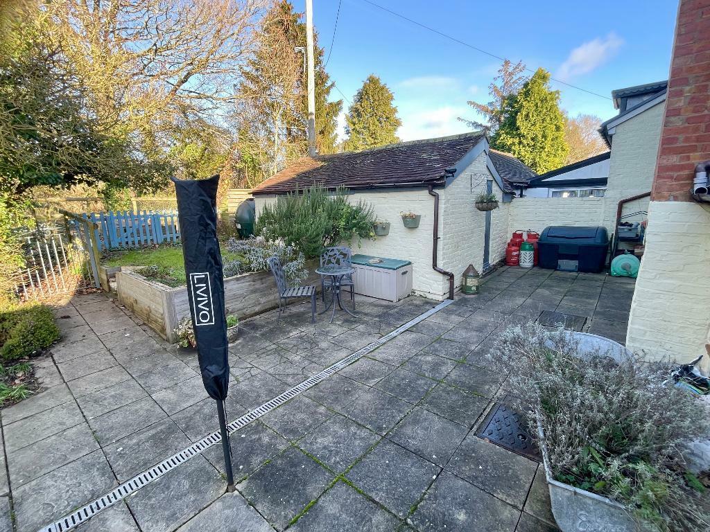 Rear courtyard, store &amp; office