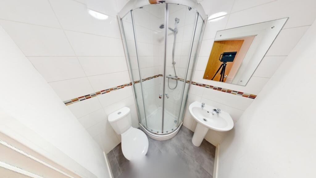 Bright and clean bathroom featuring a modern co...