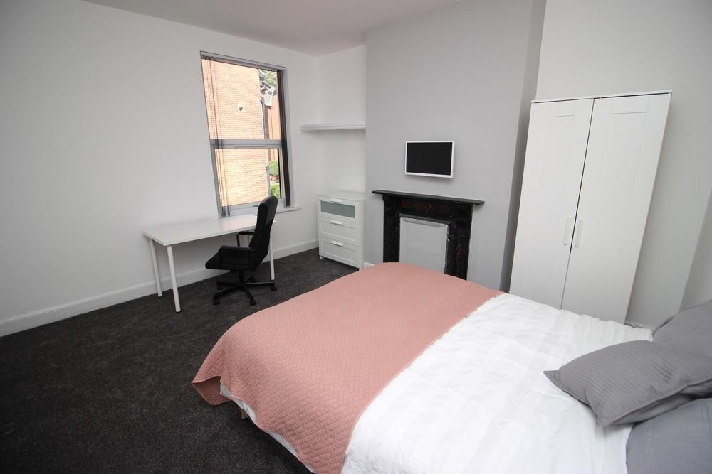 Bright and inviting master bedroom featuring a ...