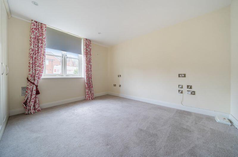 Bedroom with fitted wardrobes